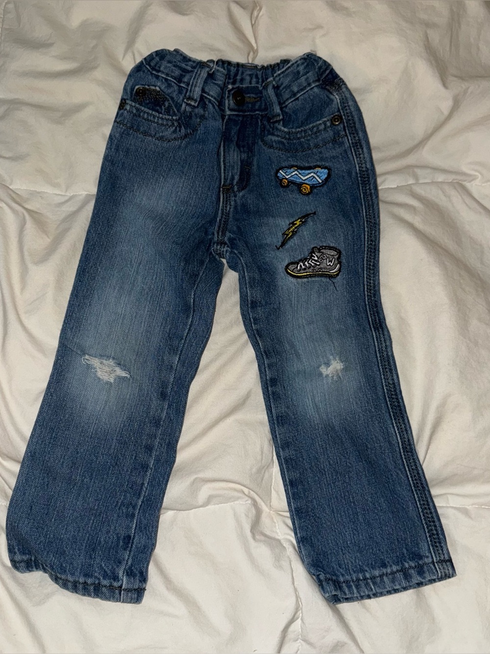 Wrangler Blue Denim Jeans with Car, Sneaker & Lightning Patches
